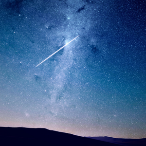 A meteor also known as a shooting star.